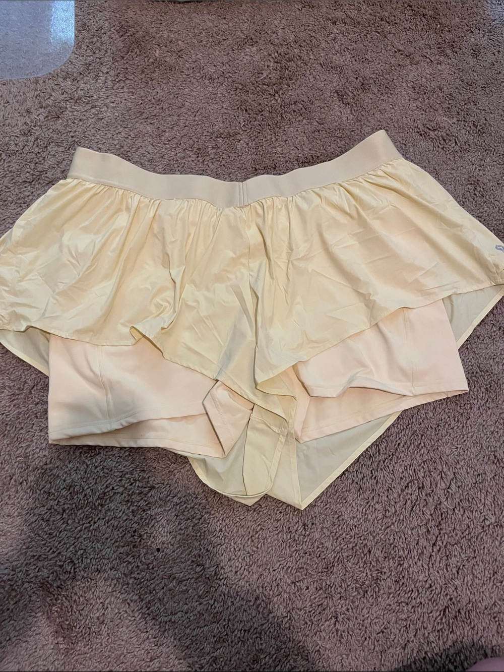 Popflex 2x ruffle light yellow running shorts